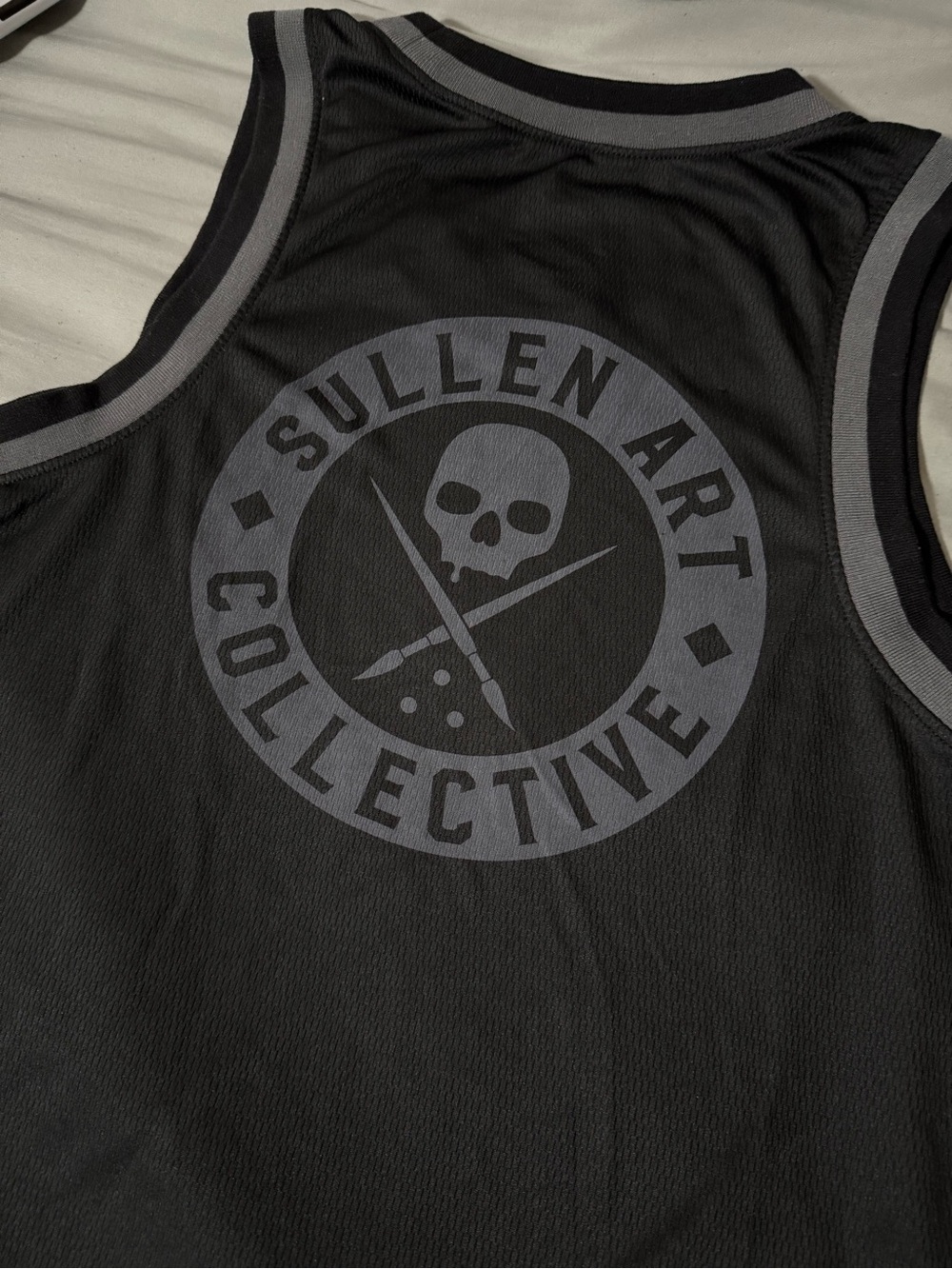 Sullen Art Collective Men's Black Sleeveless Jersey with Skull Logo